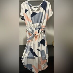 High low geometric dress w/ tie belt. Thin but silky. Never worn. Cap sleeve